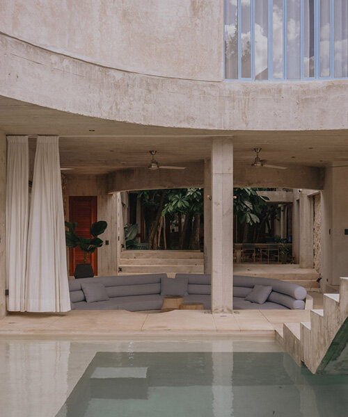 mexican house by ludwig godefroy unfolds as a porous concrete shell around lush courtyards