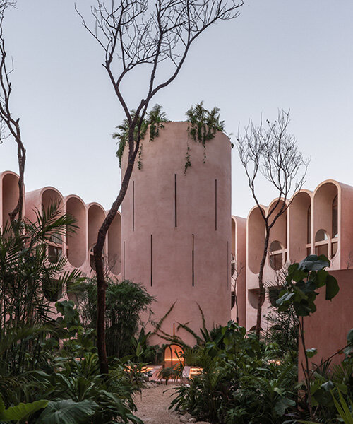 central tower rises from elliptical courtyard in V taller's arched complex in mexico