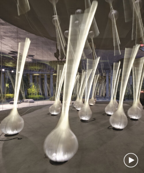 DRIFT on its robotic, softly swaying installation for AUDI at portrait milano