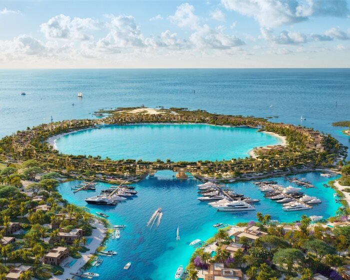 foster + partners' green residential scheme encircles a lagoon along saudi arabia's red sea