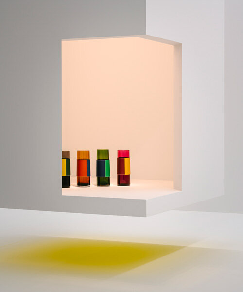 interview: Hermès stages home collections in white suspended boxes at milan's la pelota