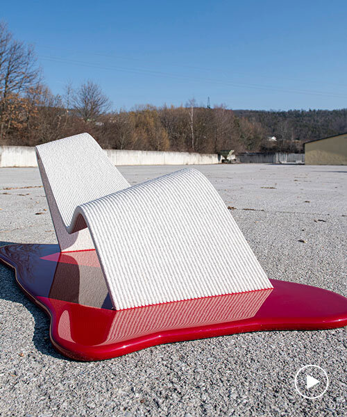 philipp aduatz mixes 3D printed concrete and red resin for sinking chair at milan design week