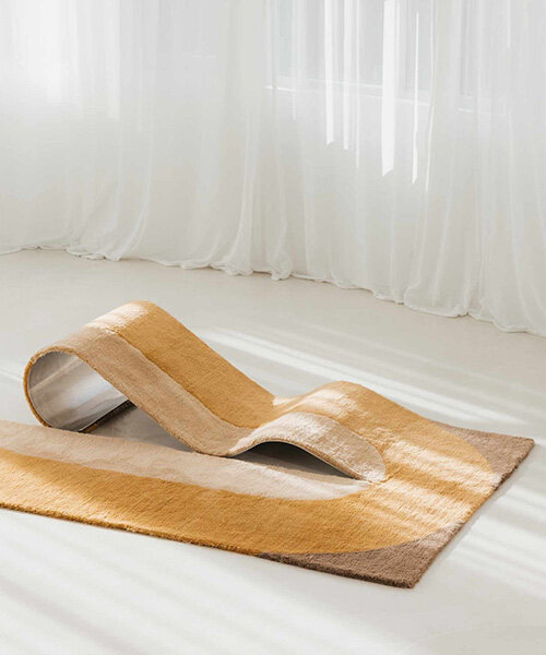 sculptural daybed emerges from gun-tufted wool rug by BUDDE and nando studio