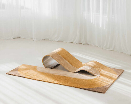 sculptural daybed emerges from gun-tufted wool rug by BUDDE and nando studio